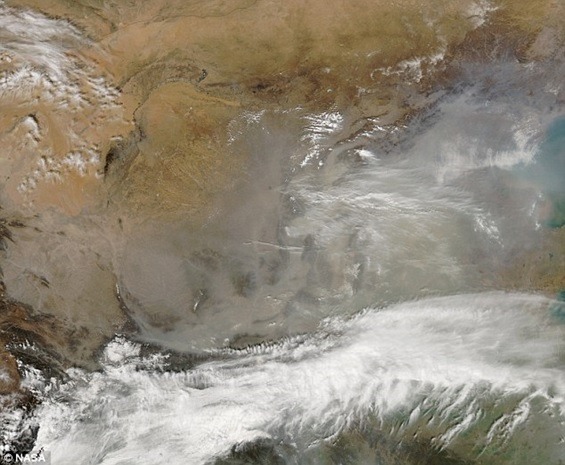 Tormenta de arena sobre Beijín, marzo 2014 (NASA)